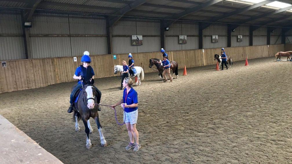 Students prepare to tackle the rising trot at the Newmarket Pony Academy