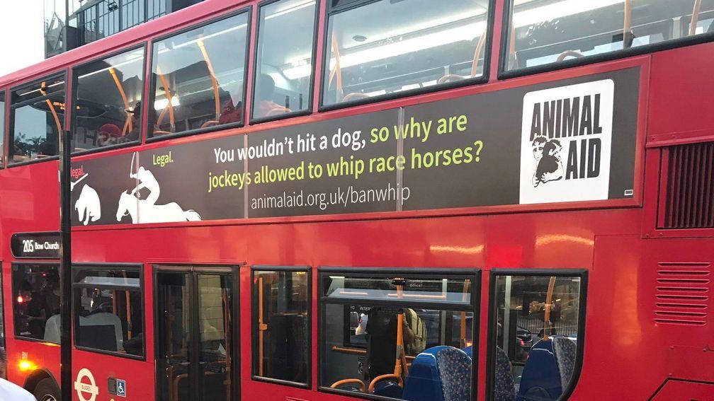 Anti-whip messages have been plastered on the side of some London buses
