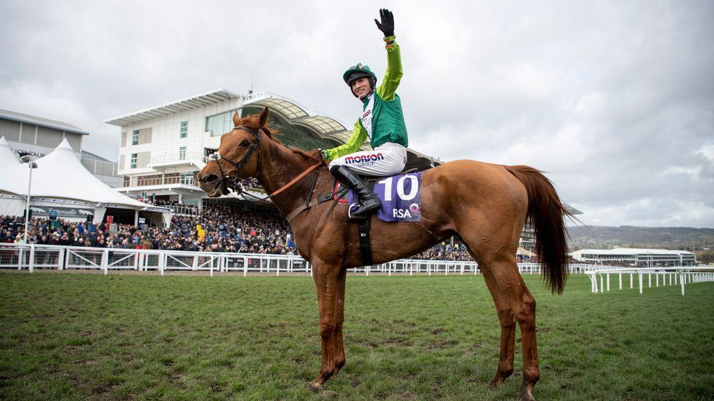 Topofthegame: Harry Cobden salutes the crowd after his mount won the RSA Chase, dispelling doubts over his temperament