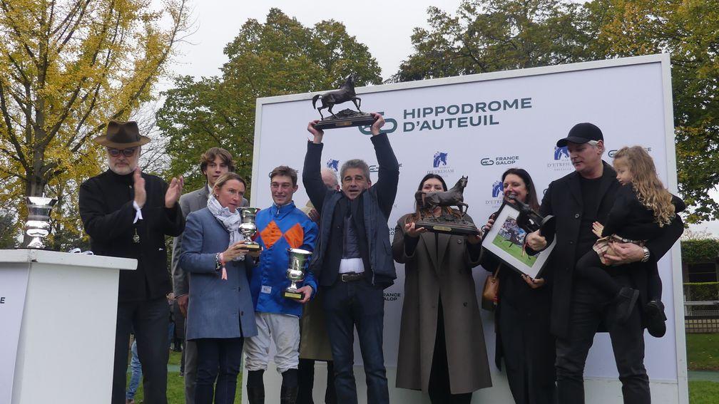 Trainer Arnaud Chaille-Chaille celebrates after Theleme wins the Grade 1 Grand Prix d'Automne