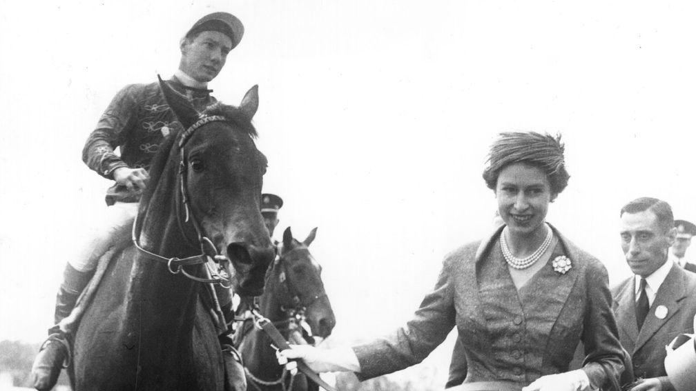 Lester Piggott is in the saddle as the Queen leads in Carrozza after winning the Oaks at Epsom to provide her with her first Classic winner