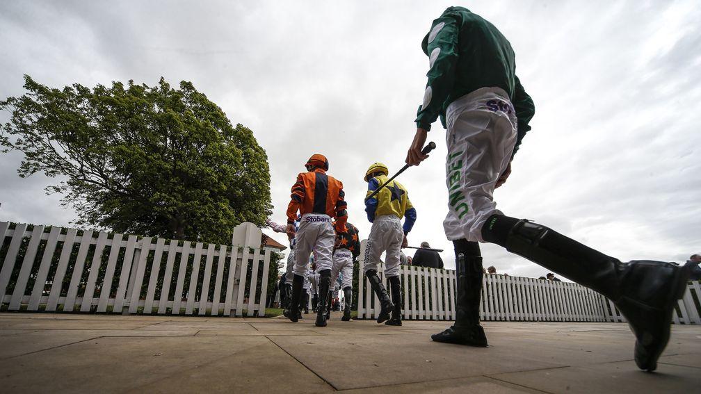 YORK, ENGLAND - MAY 16: A general view as jockeys leave the weighing room at York Racecourse on May 16, 2018 in York, United Kingdom. (Photo by Alan Crowhurst/Getty Images)