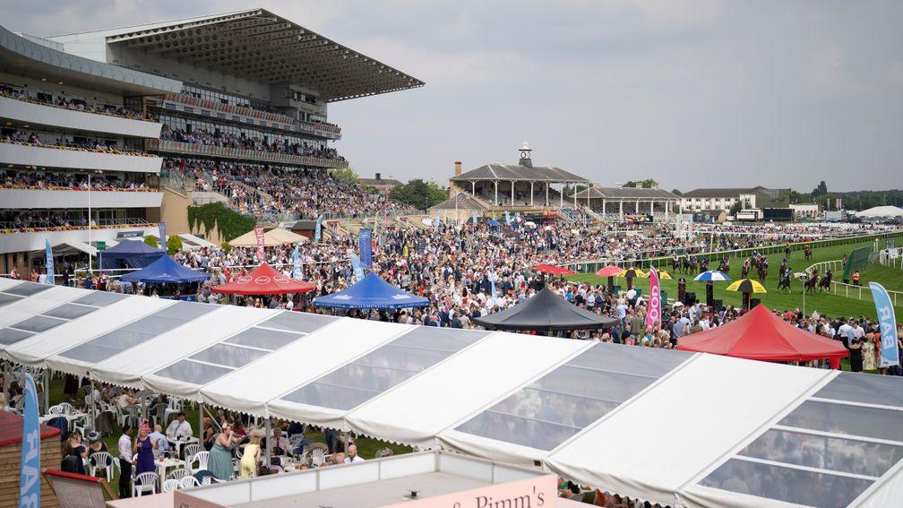 The Doncaster crowds watch on as Harrow wins the sales race