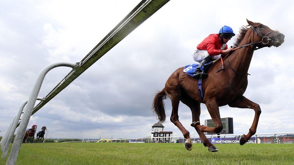 PONTEFRACT, ENGLAND - JULY 06: Lights On ridden by jockey Ryan Moore on their way to winning the Weatherbys Bloodstock Pro Pipalong Stakes at Pontefract Racecourse on July 6, 2021 in Pontefract, England. (Photo by Nigel French - Pool/Getty Images)