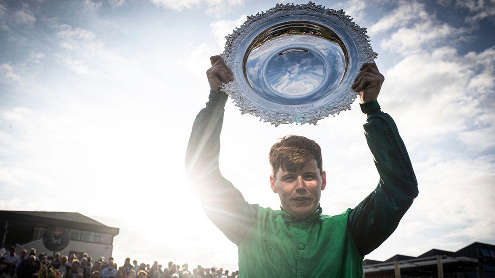 Luke Dempsey holds the Galway Plate trophy aloft following Borice's triumph at Ballybrit