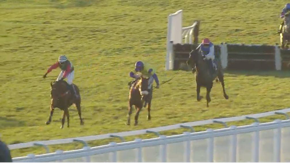 Richard Patrick becomes unbalanced on Fay Ce Que Voudras (right) and the mare heads towards the stands' rail