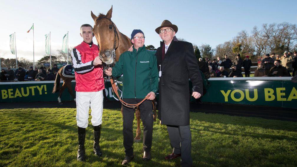 Groom Martin McMullen with Simply Ned, together with owner David Robinson and jockey Mark Walsh