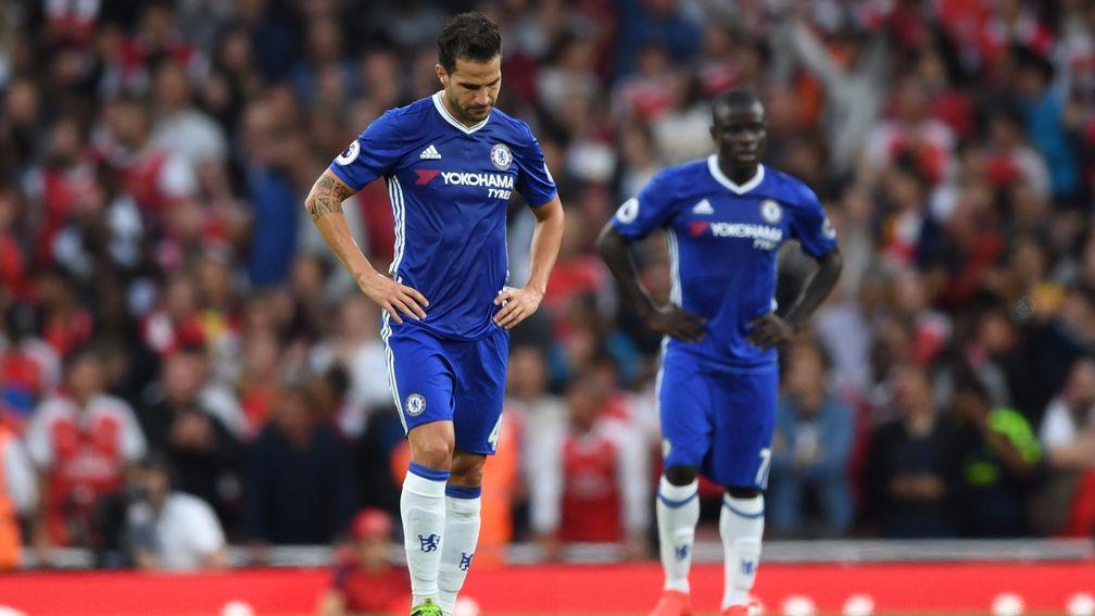 Cesc Fabregas looks dejected during a 3-0 defeat at Arsenal