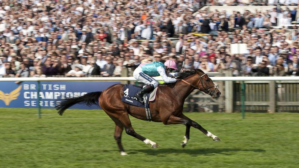 Frankel (Tom Queally) runs out an emphatic winner of the 2,000 Guineas in front of packed stands at Newmarket in 2011
