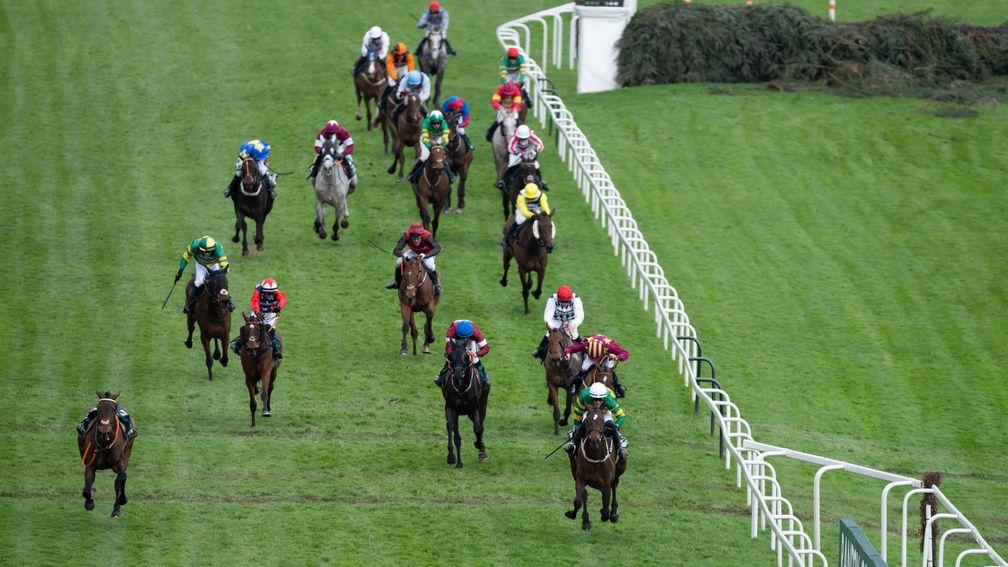 Kitty's Light (red sleeves) chases home I Am Maximus in the Randox Grand National
