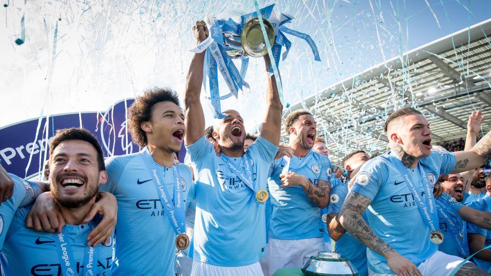 Manchester City's Vincent Kompany lifts the Premier League trophy but Pat Nevin thinks Pep Guardiola's team can cope without their defensive stalwart