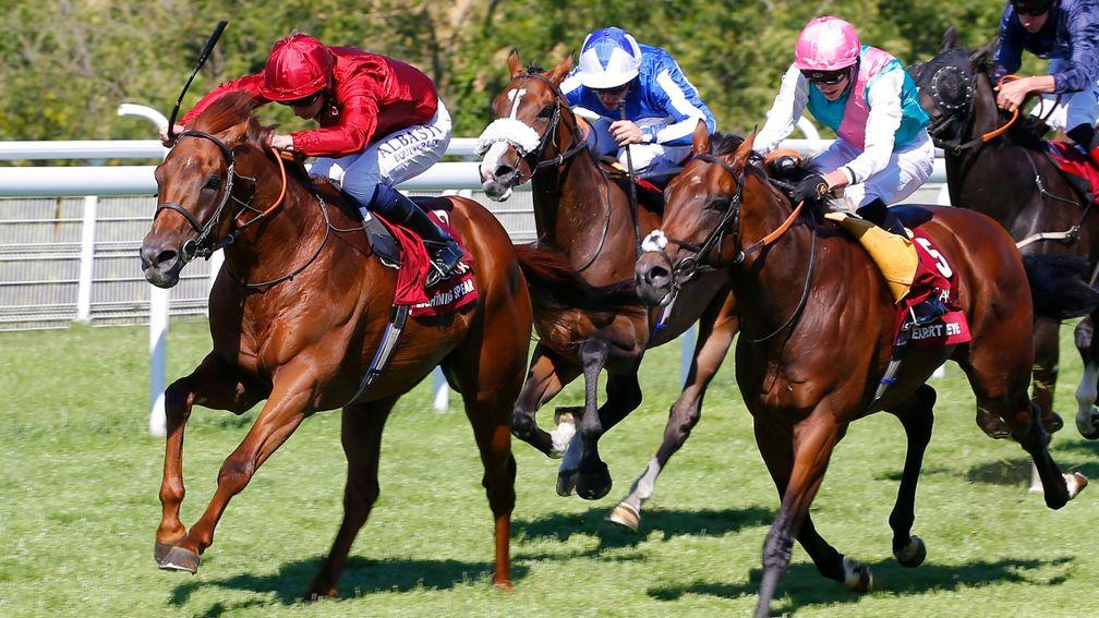 Lightning Spear comes out on top against Expert Eye (pink cap) in the Sussex Stakes last month. The pair resume rivalry at Longchamp on Sunday