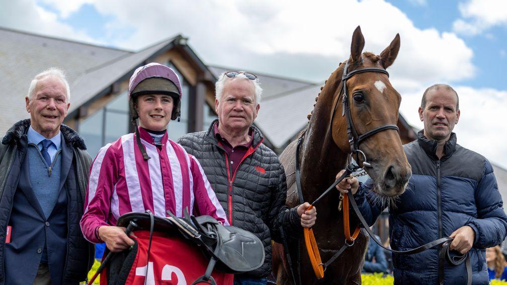 300-1 shot Sawbuck ridden by Charlie OâDwyer takes the 2m maiden hurdle for owner Dominic Jones (centre).Punchestown.Photo: Patrick McCann/Racing Post24.05.2022