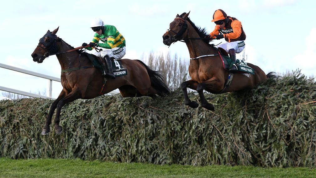 Sam Waley-Cohen and Noble Yeats clear the final fence in last year's Grand National alongside Any Second Now