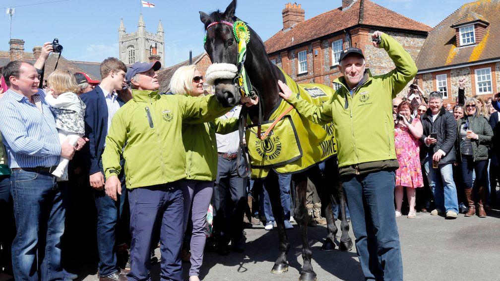 Many Clouds is greeted by the crowds in Lambourn after his Grand National victory