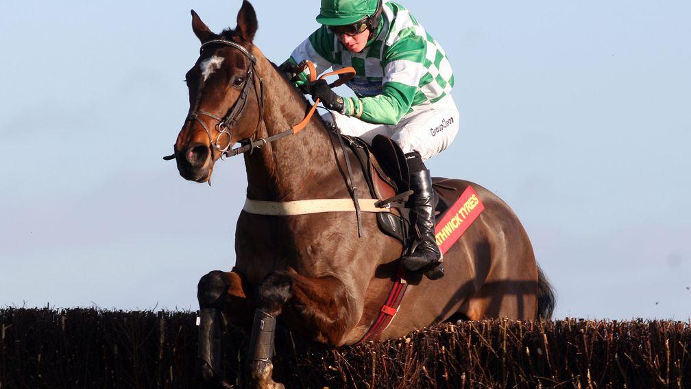 Moon Over Miami on his way to victory over Big Buck's at Newbury in December 2007