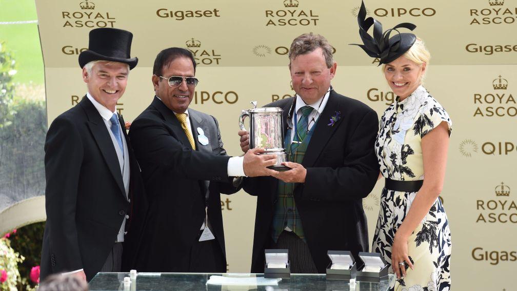 Phillip Schofield (left) and Holly Willoughby present the trophy for the King Edward VII Stakes