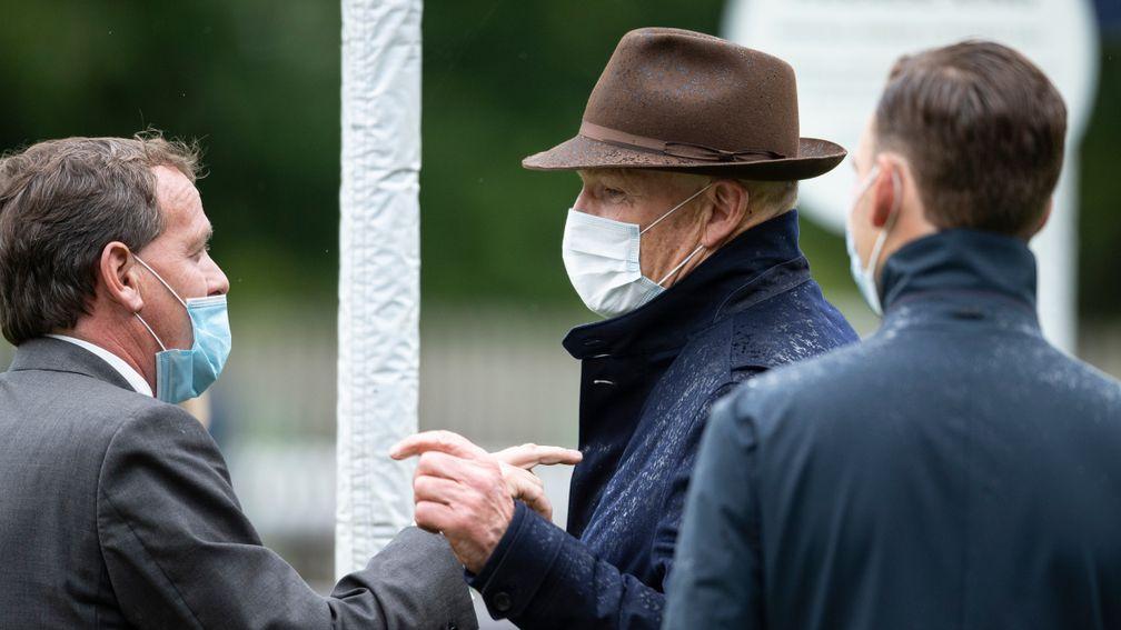 Trainer John Gosden who saddled the first and third placed Nazeef and Terebellum in the Tattersalls Falmouth Stakes jokes with Richard Hannon who saddled the 2nd placed Billesdon BrookNewmarket 10.7.20 Pic: Edward Whitaker