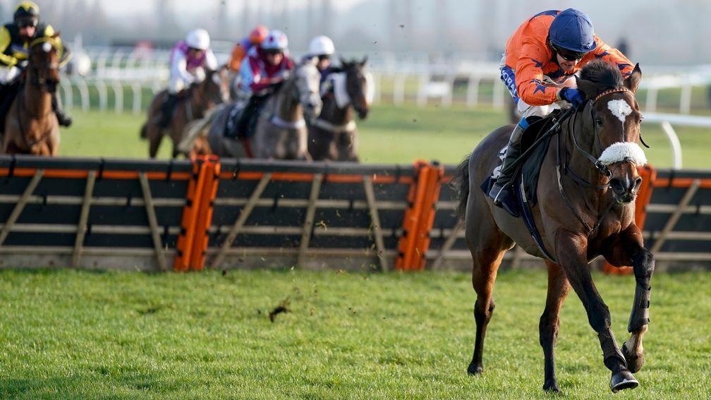 NEWBURY, ENGLAND - DECEMBER 29: Tom Scudamore riding Panic Attack clear the last to win The MansionBet Cheers To 2021 Mares' Handicap Hurdle at Newbury Racecourse on December 29, 2020 in Newbury, England. Owners are allowed to attend if they have a runner