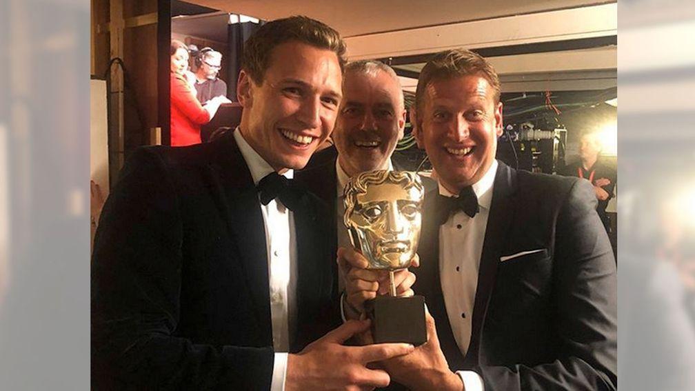 From left to right: Oli Bell, Paul McNamara and Ed Chamberlin celebrate with their Bafta