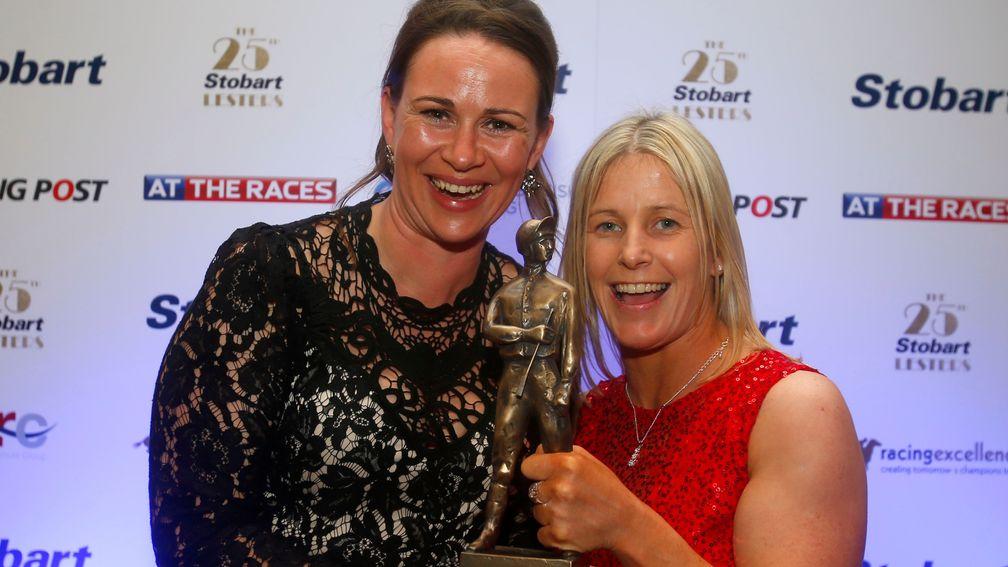 Cathy Gannon (right) receives her Lady Jockey of the Year award at the Lesters in 2015 from Harriet Collins