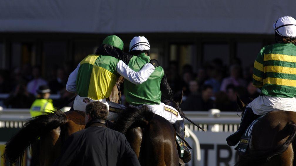Niall Madden: embraced by Ruby Walsh after winning the Aintree Grand National aboard Numbersixvalverde