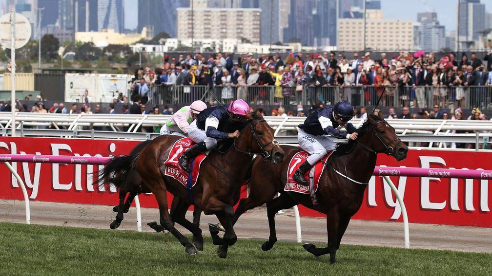 Battle royal: O'Brien takes the Melbourne Cup, as Aidan's Jan Vermeer is collared by son Joseph's Rekindling (Corey Brown, left)