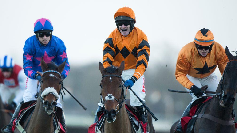 Thistlecrack (Tom Scudamore) wins the King George from Cue Card (Paddy Brennan,left)Kempton 26.12.16 Pic: Edward Whitaker