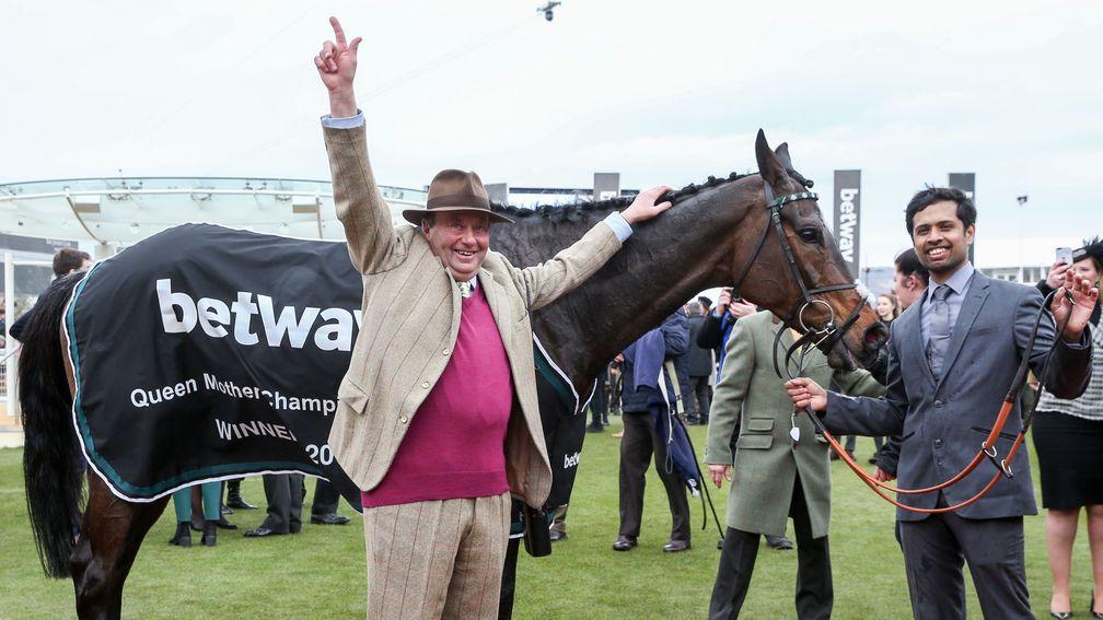 Champions together: champion trainer Nicky Henderson salutes his Champion Chase winner Altior at Cheltenham