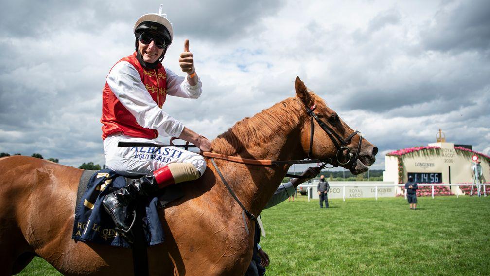 Adam Kirby celebrates after winning the Commonwealth Cup aboard Golden Horde