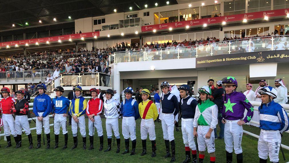 The jockeys line up before the first Bahrain International Trophy at Rashid Equestrian & Horseracing Club