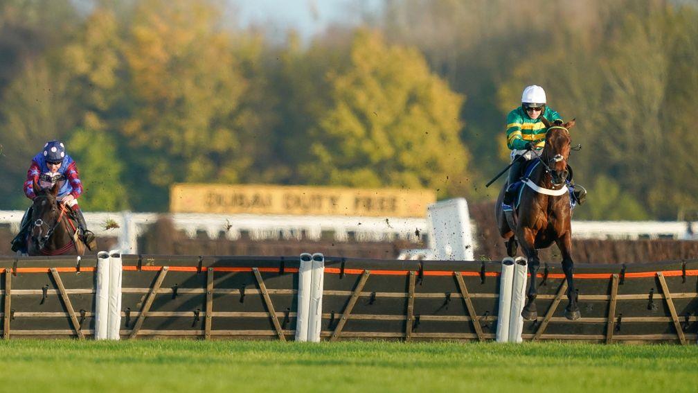 NEWBURY, ENGLAND - NOVEMBER 25: Jonjo O'Neill Jr riding Champ clear the last to win The Coral Long Distance Hurdle at Newbury Racecourse on November 25, 2022 in Newbury, England. (Photo by Alan Crowhurst/Getty Images)