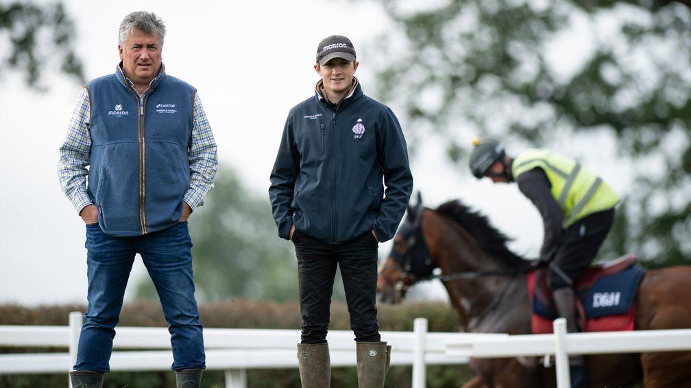 Paul Nicholls with assistant trainer Harry Derham on the Ditcheat gallops