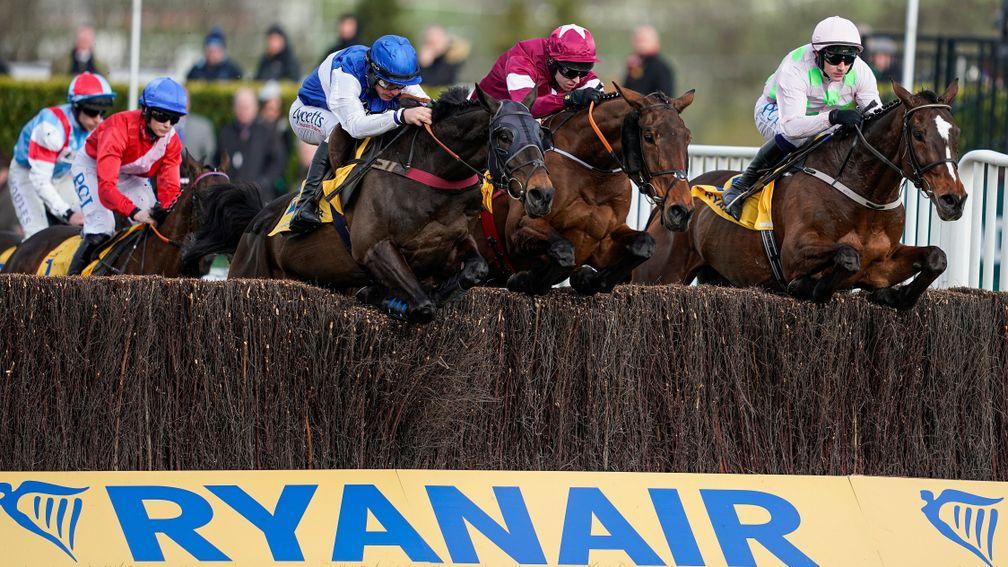 CHELTENHAM, ENGLAND - MARCH 12: Paul Townend riding Min (R, pink) on their way to winnng The Ryanair Chase at Cheltenham Racecourse on March 12, 2020 in Cheltenham, England. (Photo by Alan Crowhurst/Getty Images)