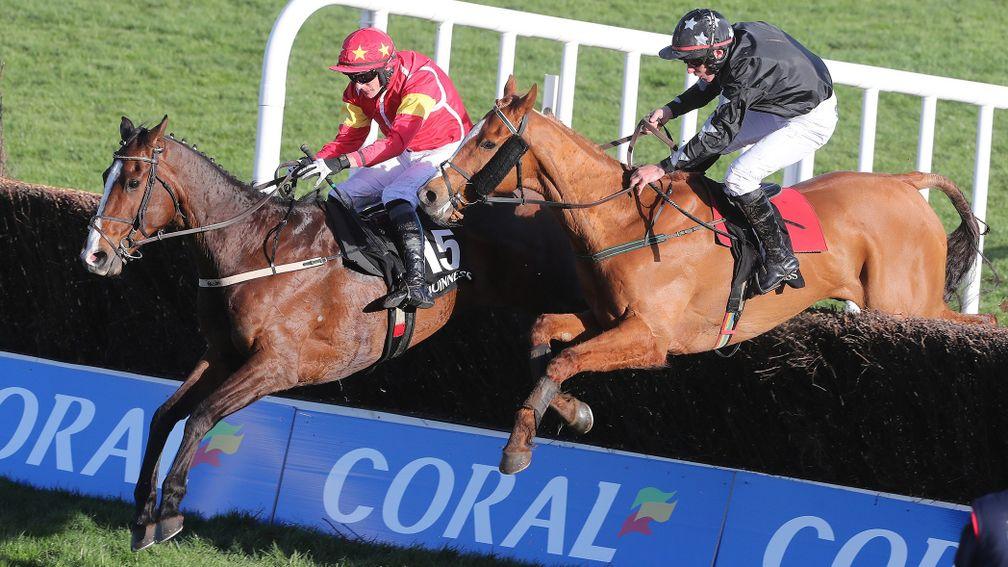 Punchestown Wed 25 April 2018  Picture: Caroline NorrisPatricks Park ridden by Paul Townend, far side, winner, and Blast Of Koeman ridden by Phillip Enright, 2nd, jumping the last fence in The Guinness Handicap Steeplechase