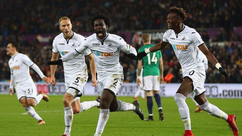 Wilfried Bony (centre) secured Swansea a vital victory over West Brom
