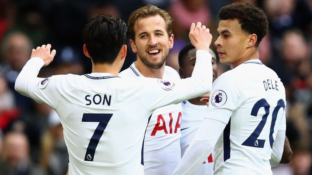 Harry Kane of Tottenham Hotspur celebrates with Heung-Min Son and Dele Alli
