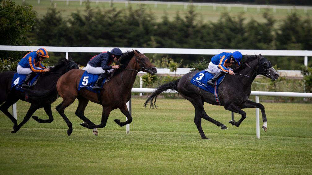 Cormorant and Padraig Beggy on their way to winning the Derrinstown Derby Trial ahead of Russian Emperor