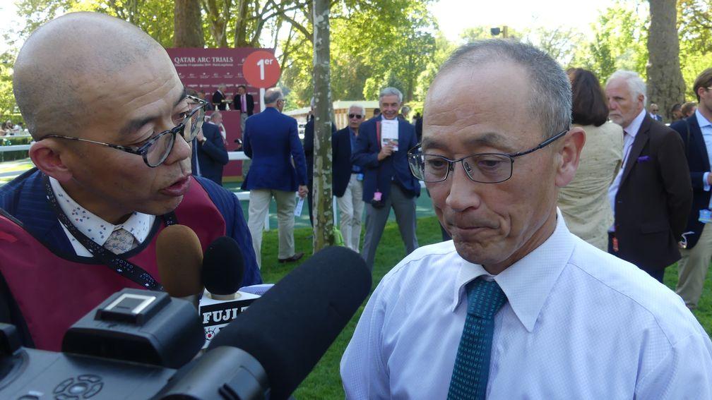 Kiseki's trainer, Katsuhiko Sumii, debriefs the Japanese press after his horse finished third in the Qatar Prix Foy