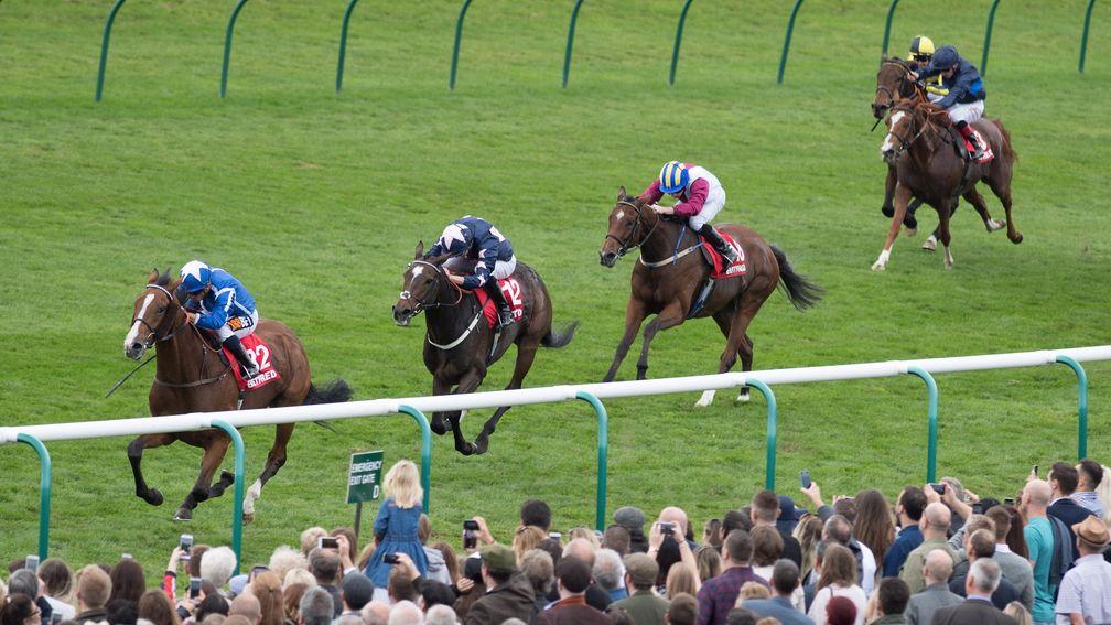 Withhold (Silvestre de Sousa) wins the Betfred Cesarewitch from London Prize and Lagostovegas at Newmarket on Saturday