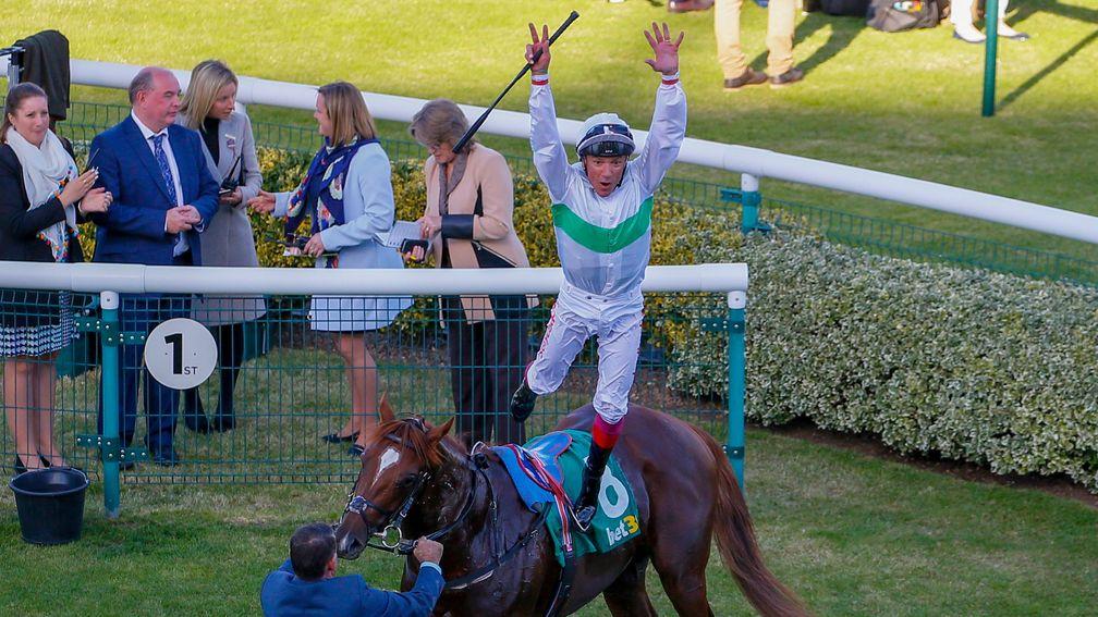 Frankie Dettori celebrates Cambridgeshire victory with a flying dismount from Wissahickon
