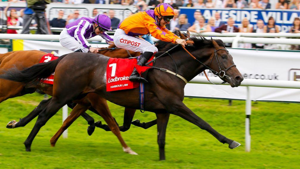 Baker lands the 2016 St Leger on Harbour Law (near side) from Ventura Storm