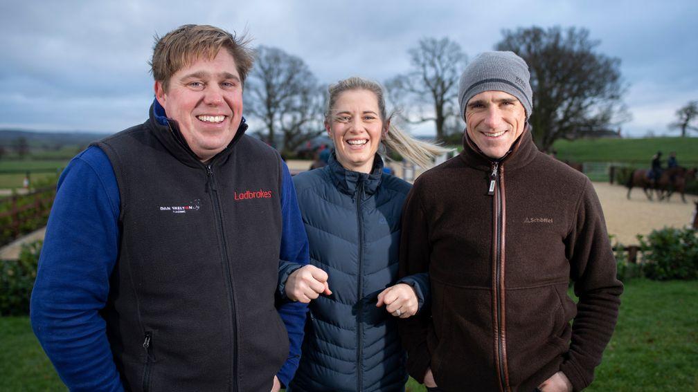 'Everyone here has the same ultimate goal for the horses': Dan Skelton, Bridget Andrews and Harry Skelton enjoy a chilly moment at the yard