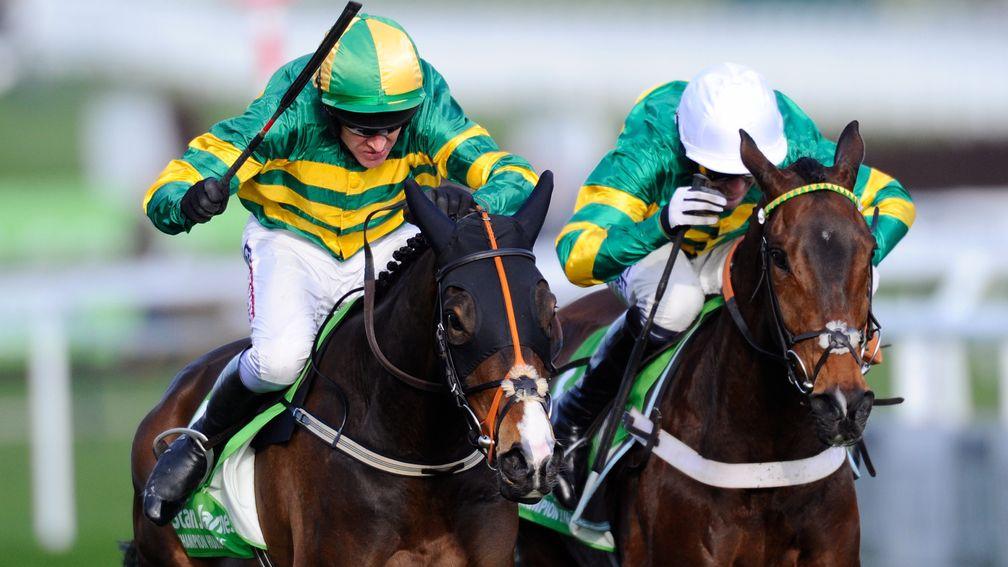 Jezki and Barry Geraghty (left) deny My Tent Or Yours and Sir Anthony McCoy in the 2014 Champion Hurdle