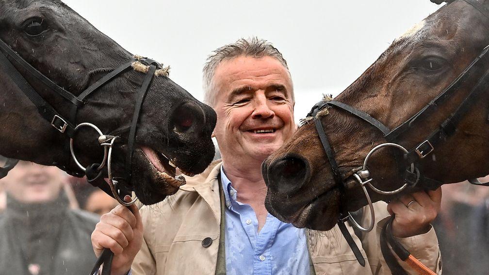 Michael O'Leary with Delta Work (left) and Tiger Roll after the 2022 cross-country chase