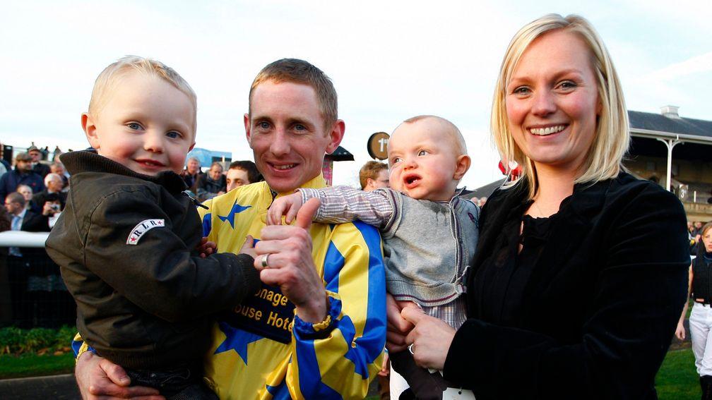 Big break: Paul Hanagan celebrates winning the 2010 jockeys' title with wife Anna and sons Josh and Sam