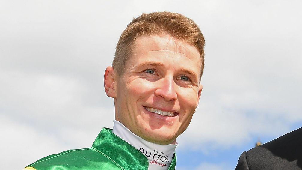 James McDonald is all smiles after riding the winner of the Empire Rose Stkaes at Flemington on Saturday
