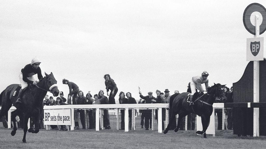 PA library file dated 31/03/1973 of Red Rum ridden by jockey Brian Fletcher wins the Grand national Steeplechase at Aintree ahead of Crisp ridden by jockey Richard Pitman (right). See PA story RACING Happened Fletcher. PRESS ASSOCIATION Photo. Photo credi