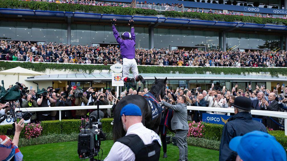 Frankie Dettori: celebrates with a flying dismount after King Of Steel wins the Champion Stakes
