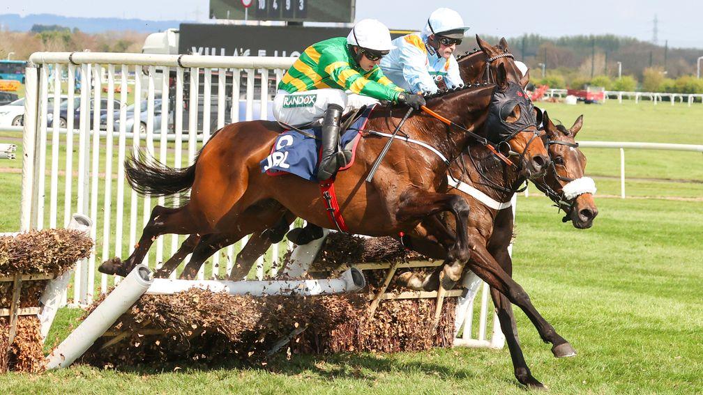 Sire Su Berlais joins and passes Marie's Rock at the final hurdle